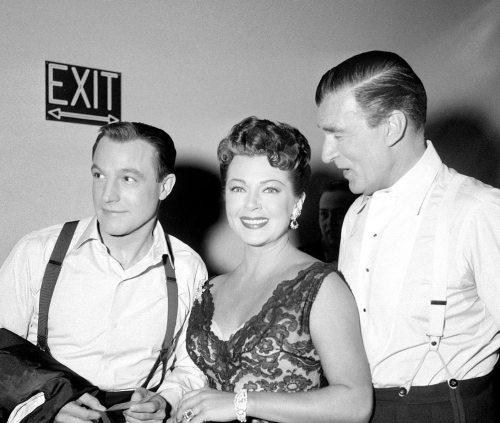 Kelly, Lana Turner, and Walter Pidgeon in a wardrobe room at CBS for the show &ldquo;Toast of the To