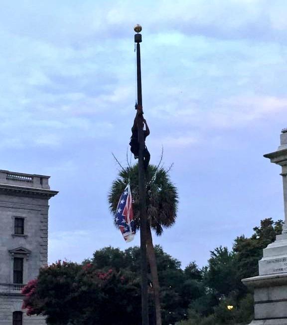 Brittany “Bree” Newsome, a BLACK WOMAN, removes the confederate flag!