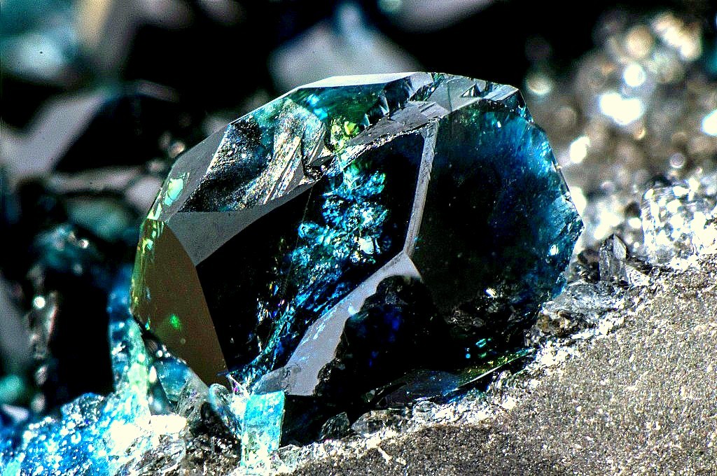 underthescopemin:  Lazulite  crystal of lazulite, blue in color, with the inside