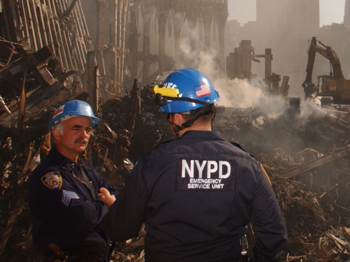 420bongkesha: Two NYPD officers at the World Trade Center site five weeks after the attacks.