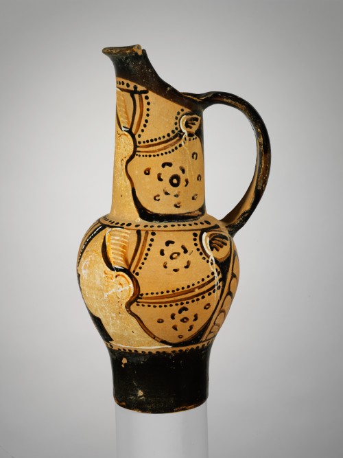 tintinnabulums: Terracotta oinochoe. 300 BC; terracotta. Attributed to the Torcop Group. The Me