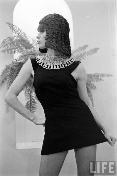 Cleopatra-inspired black wool swimsuit and straw beach hat by Grès(Paul Schutzer. 1962)