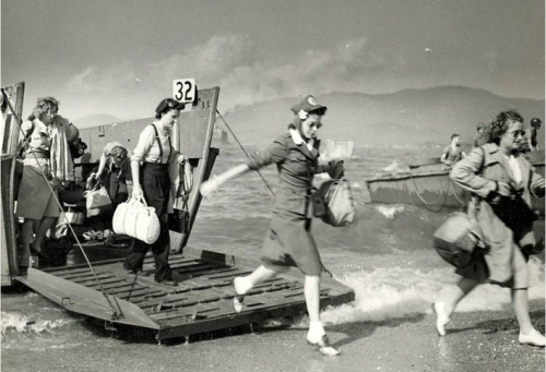 particularscarf: bacon-radio: historicaltimes: Normandy landing that you didnt see. 1944 Red Cross w