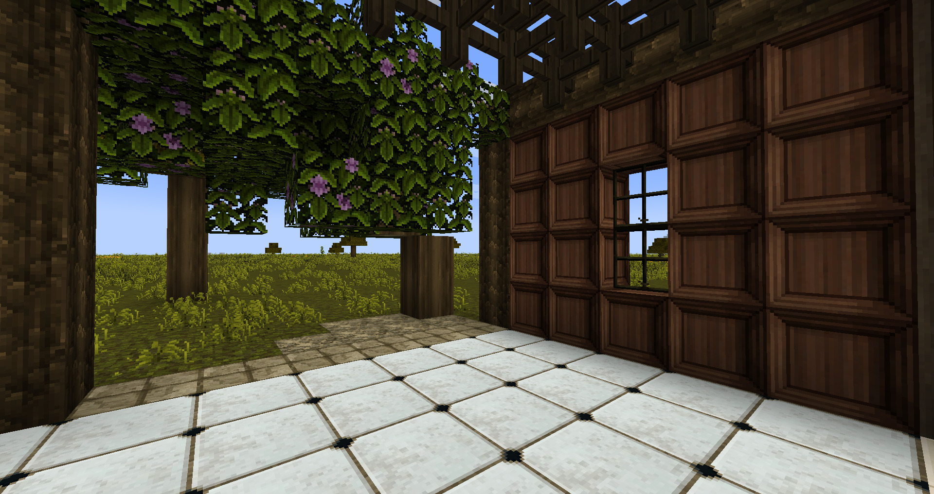 A Minecraft screenshot showing a new wall and flooring textures and azalea leaves.