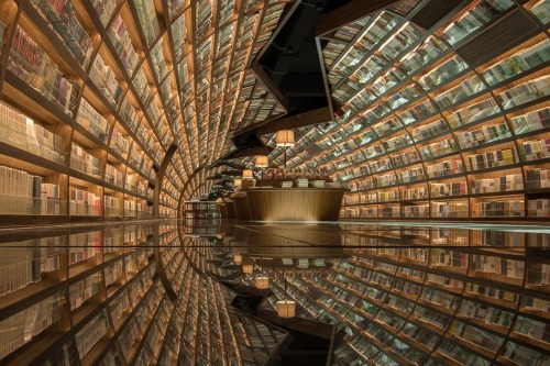 darkersolstice: archatlas: A Curved Library Reflected by the Floors Like Water Architecture firm XL-
