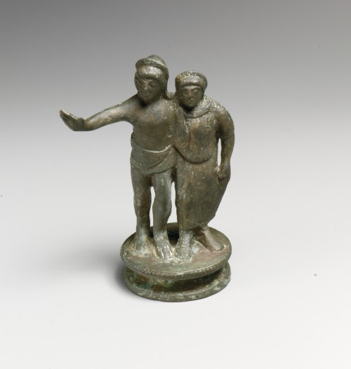 Statuette of a man and woman. 5th c. BC.; bronze. Metropolitan Museum of Art. 