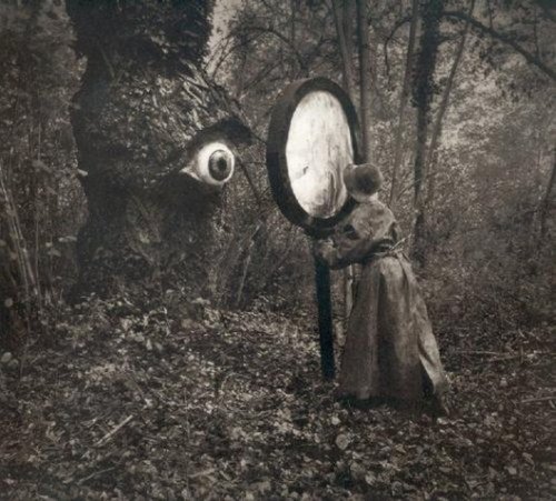 odditiesoflife:  Strange Vintage Photos  These are some of the best strange vintage photos I have found on the web. I have no idea where any of them are from, but they each have a very unique possible story line. The eye in the tree is the best. If anyone