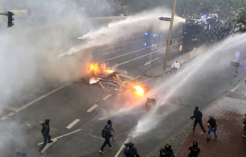 queeranarchism:  60 year old historian Martin Bühler (who identified himself to the press, I do not identify activists without consent) appears to ‘photobomb’ a lot of media images of the G20 in Hamburg. In reality he is a long time observer documenting