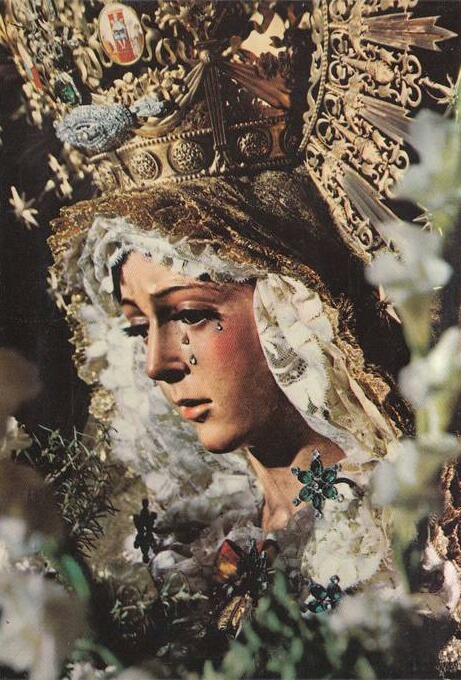 The statue of La Esperanza Macarena, or the Virgin of Hope of Macarena, in Seville, Spain. (via alla