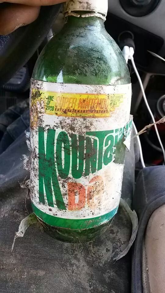 atomictiki:  kastiakbc:  retrogamingblog:  Someone found a bottle of Mountain Dew from