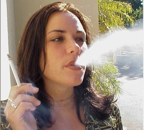handcock69:  compulsion2smoke:  —Sexy exhale!!  Sexy Smoker