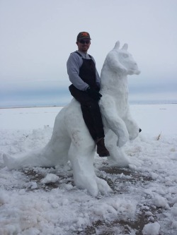 laughingsquid:  A Man Builds a Snowman That Looks Like a Tauntaun From ‘Star Wars’ and Sits on Its Back