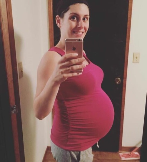 Sexy mommy with an amazing baby bump