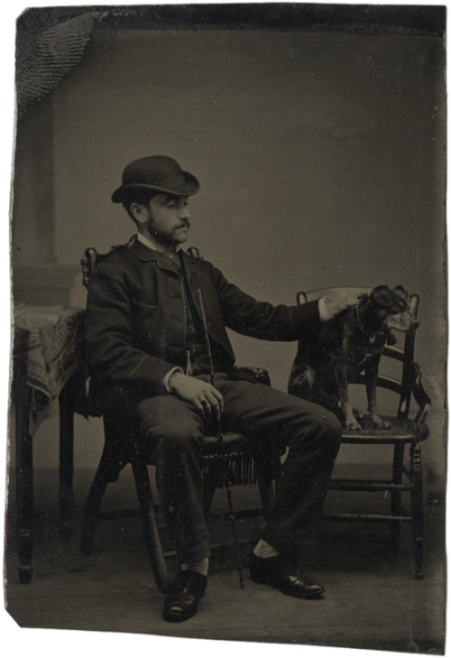 ca. 1883, [tintype portrait of a man petting his dog]via I Photo Central, Charles Schwartz Ltd.