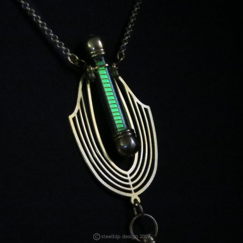 Tritium Deco DropSomething a bit more simple - a green Tritium vial, wrapped with fine gold wire and