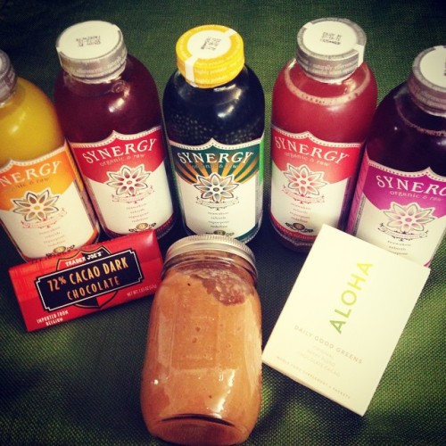 Healthy road trip essentials: kombucha, homemade apple sauce, aloha, dark chocolate  @alohamoment @t