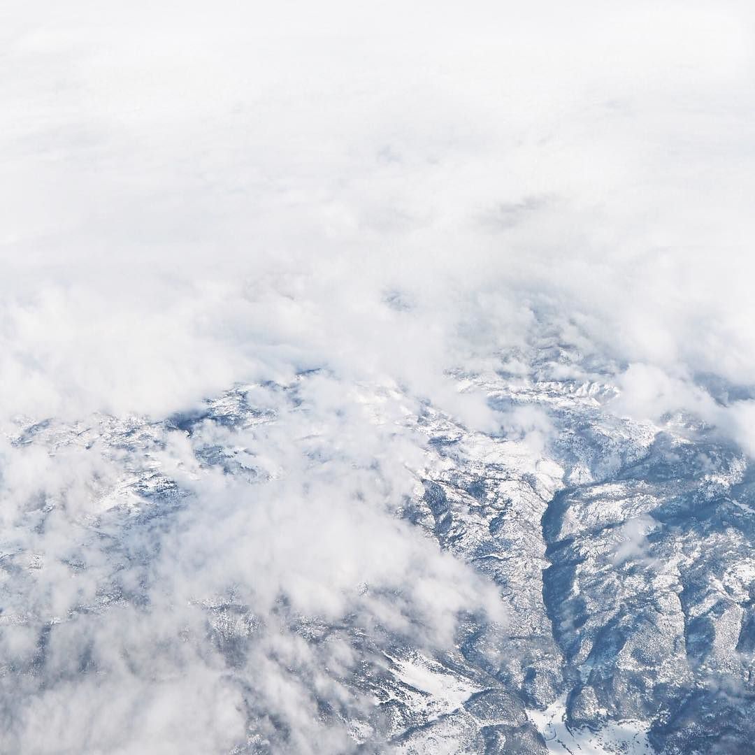 One moment there were snow capped mountains and the next, we were touching down in