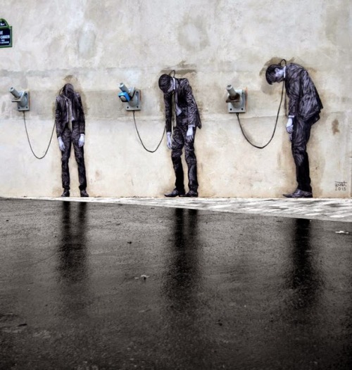 asylum-art-2:The infernal machine – The latest street art creations of french artist Levalet Here a