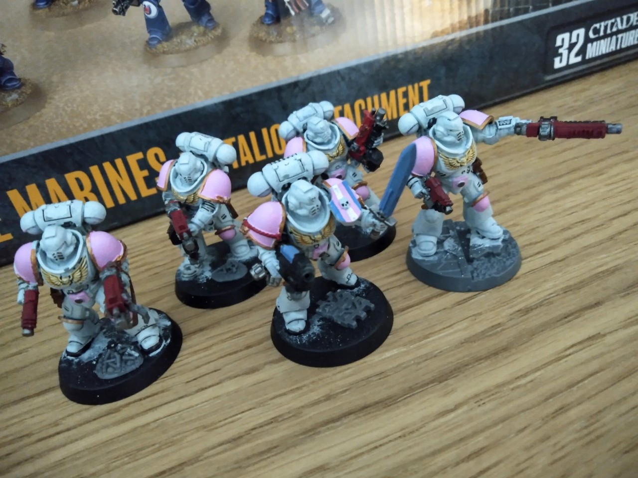 Decisions decisions and some hardly work in progress on a kill team.