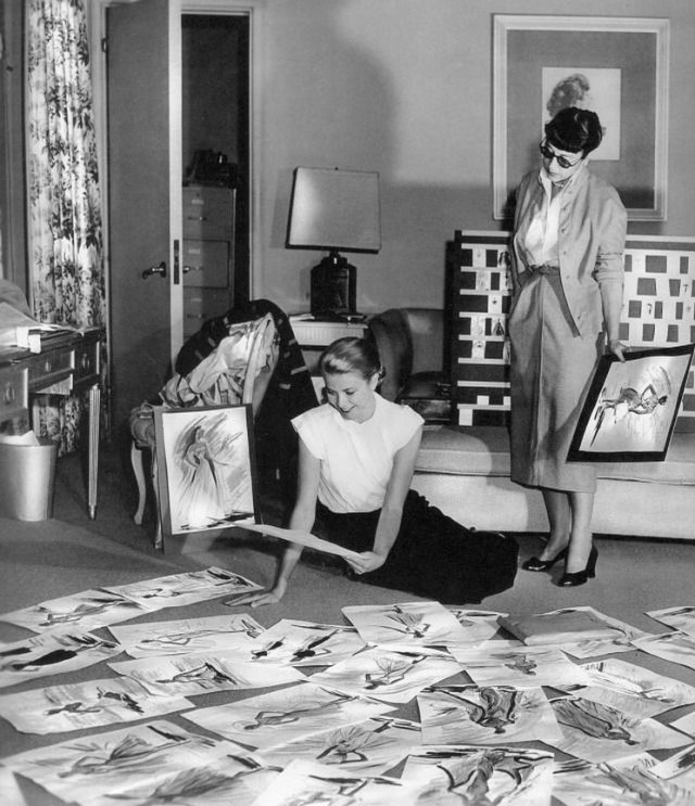 Grace Kelly and Edith Head looking over costume designs for To Catch a Thief (1955)
