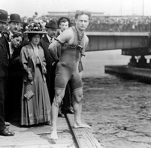 Houdini before his near fatal jump & escape from the icy water below the Queen Street bridge in Melbourne, Australia, Feb. 18th, 1910. Nudes & Noises  