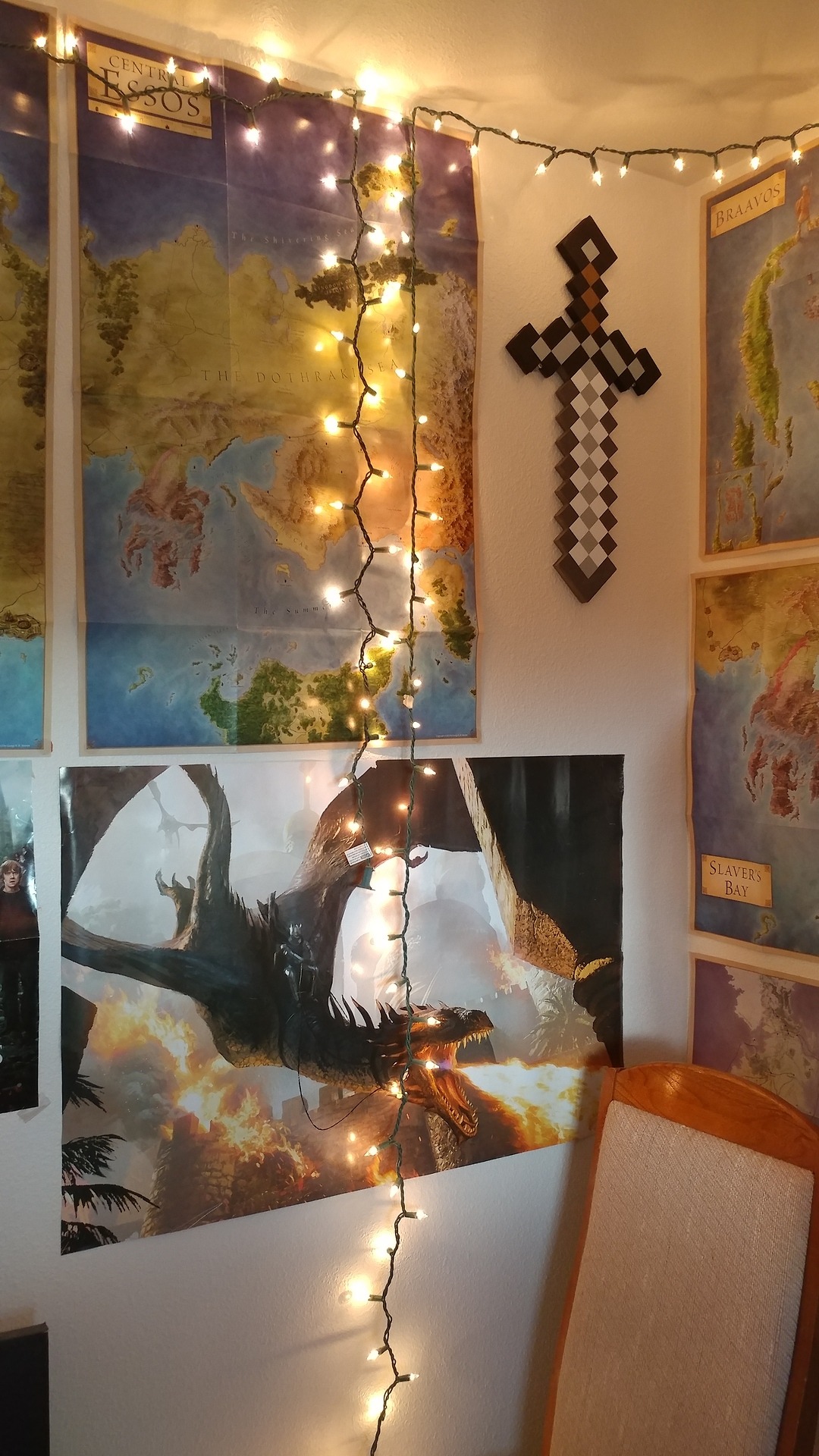 Updated pictures of my nerd room. I hung up my Minecraft sword next to my maps of
