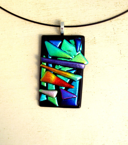 Two new glass pendants in different styles that I just got some new photos of.  Like my work an