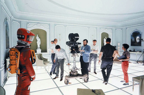 Keir Dullea waits, while Stanley Kubrick and crew set up the next shot / during production of Mr. Ku