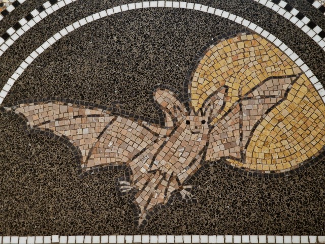 lichfucker:hemaris:bat mosaic at the rijksmuseum you are all i think about 💖[image description: a mosaic of a smiling bat flying in front of a full moon. end id]