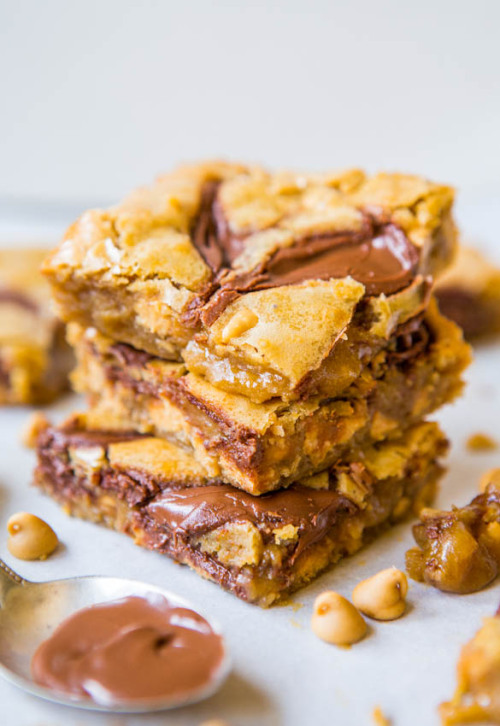 deliciousdynasty:  Nutella-Swirled Peanut Butter Chip Blondies 