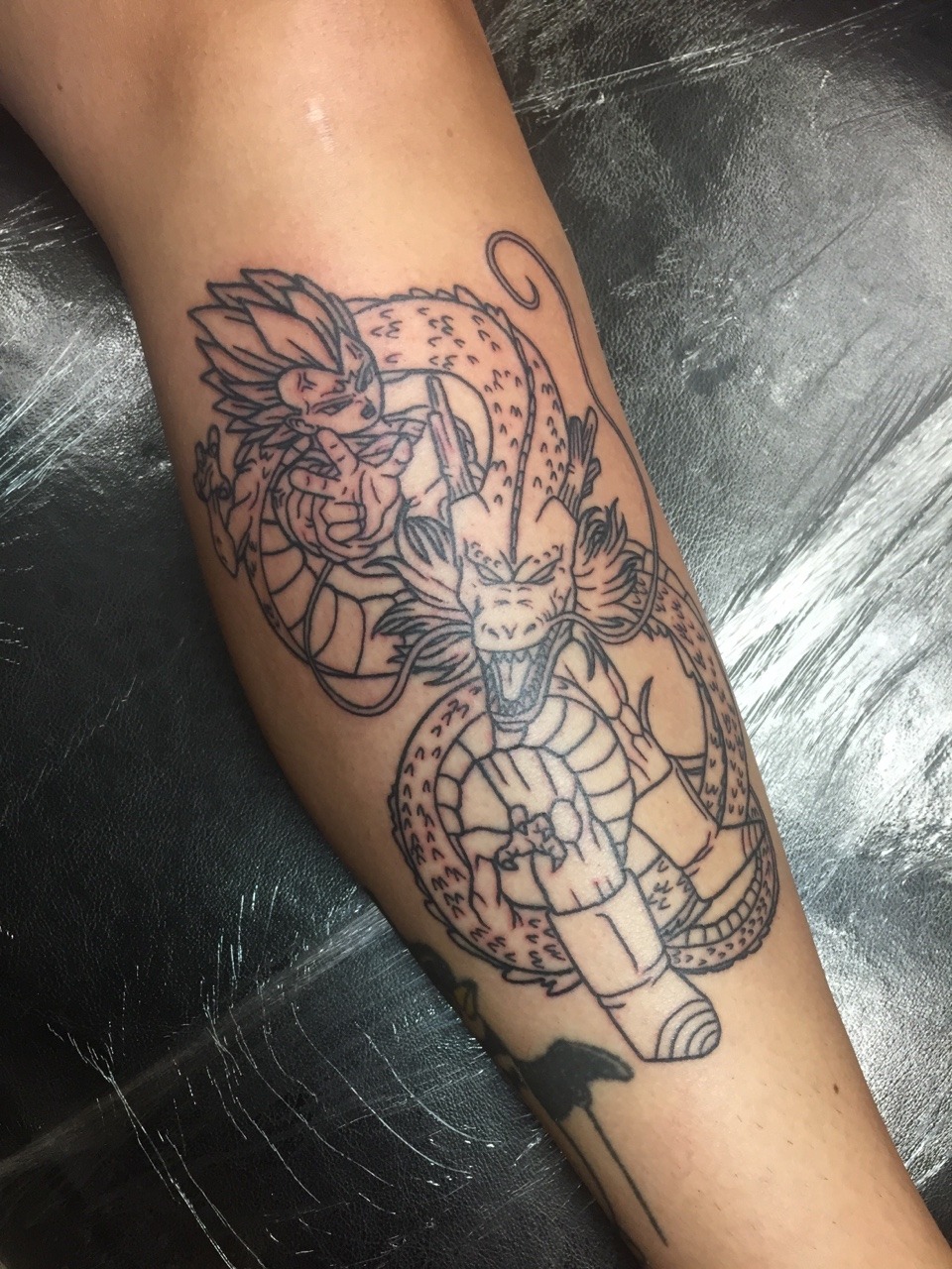 penguinbekkah: Got the outline to my Majin Vegeta and Shenron on my shin! Couldn’t