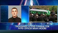 gop-tea-pub:  Mourners, including thousands of police officers from across the U.S., paid their respects at the funeral of slain NYPD Officer Brian Moore on Friday.