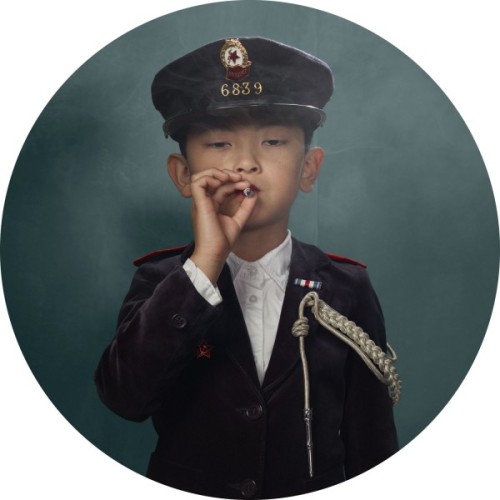 conveyerofcool:   Cool Photography: Smoking Kids Photographer Frieke Janssens poses young children with cigarettes. “I wanted to isolate the viewer’s focus on the issue of smoking itself. I felt that children smoking would have a surreal impact upon