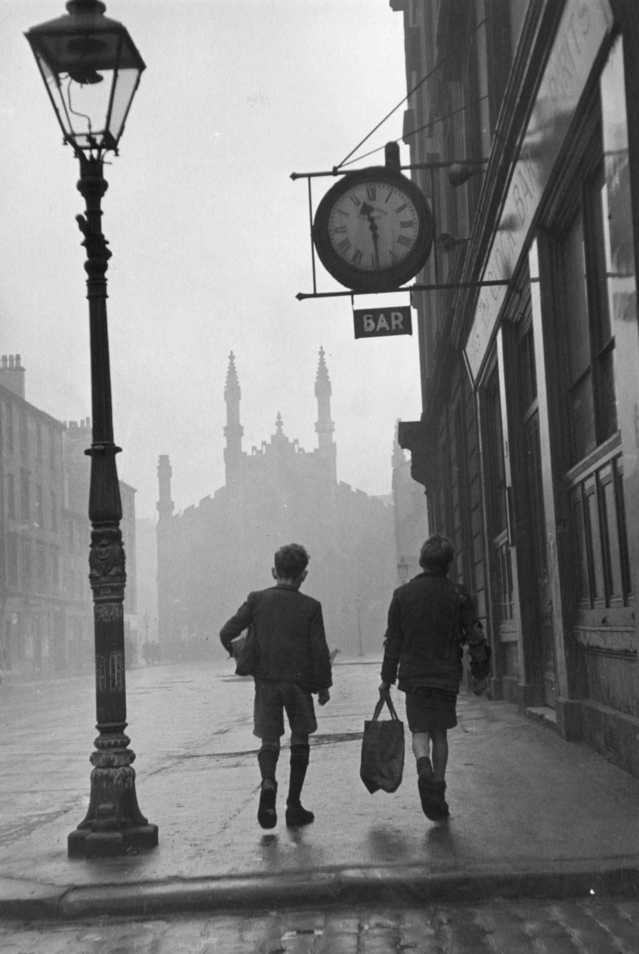 Bert Hardy. Glasgow Boys: Two boys walking along a street in the run-down Gorbals area of Glasgow, 31st January 1948.