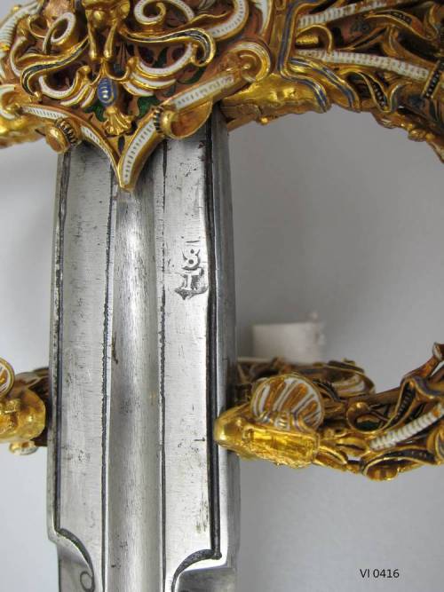 A golden hilted Rapier and Parrying Dagger set delicately decorated with enamel, given by Emperor Ma
