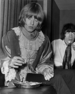 Goo-Goo-Gjoob-Goo-Goo:  Brian Jones And Bill Wyman Eating During A Recording Session,