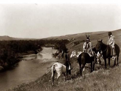Three Piegan Indians on Horseback. Photographed in 1910 by Edward S. Curtis.