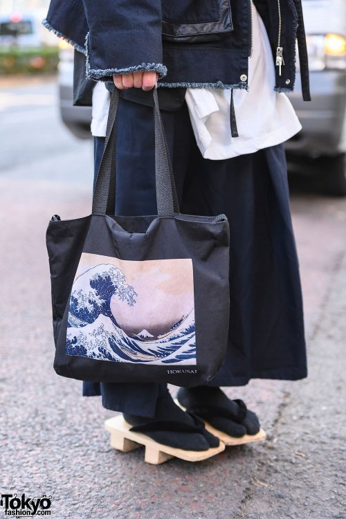 Japanese apparel worker Takamitsu on the street in Harajuku wearing a jacket and top from Not Conven