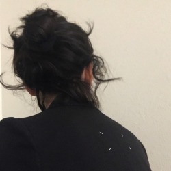 undomyleather:Finally able to put my hair in a bun.  Messy tho 👿