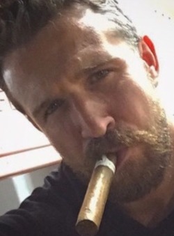 cigarstud34:  magnumdad:  jaspers01: Makes me imagine (lots of sexy things) After he’s fired up that cigar.  Fuck me.