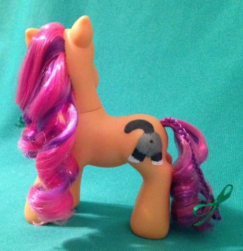 A custom My Little Pony I made for a friend. Yep, those are cat butts on her cutie mark.