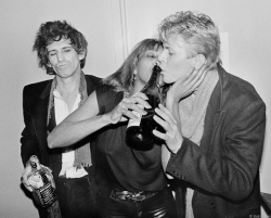 velvetnyc:Keith Richards, Tina Turner &amp; David Bowie, New York City 1983 by Bob Gruen