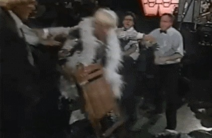 caliconfidentialwrestling:A disoriented Piper accidentally blasts Vince McMahon with a chair shot in