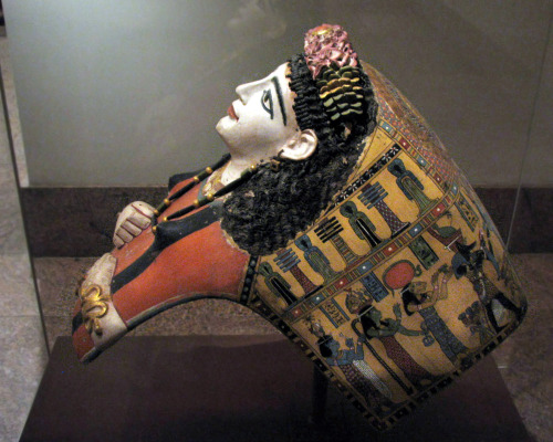 Mummy mask of woman wearing a jeweled garland. Made of plaster, cartonnage and paint, 1st c. A.D.