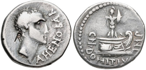 A roman silver coin from 1st century BC. The name refers to naval commander Gnaeus  Domitianus 