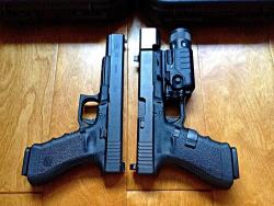 gunrunnerhell:  Glocked My Glock 17L next to my brick-of-a-gun, my Glock 20. I just got some Trijicon Suppressor Sights for it cause I’m planning on getting a Trijicon RMR and installing it onto the slide. I then have to Cerakote the slide and the custom