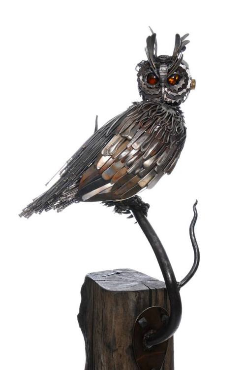 steampunktendencies:Steampunk Eagle Owl made from cutlery, motorbike, and bicycle parts. Mounted on 