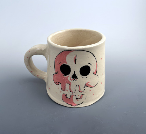 This skull mug never made it farther then kiln to kitchen because I liked it too much.  It is based 