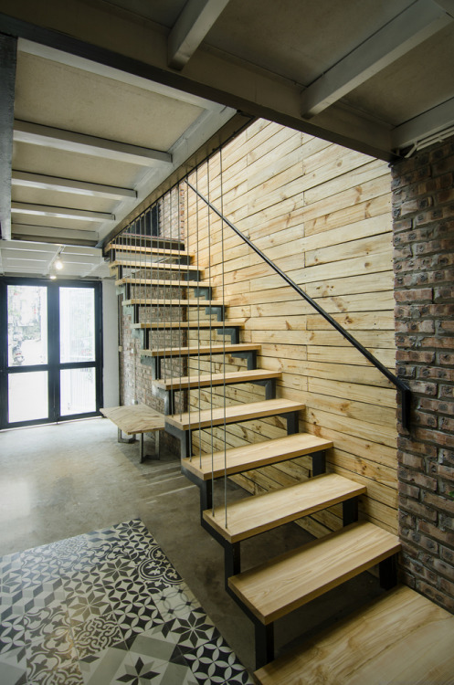 remodelproj:Steel fabricated - wood treads with tension cable stairs - next to interior courtyard