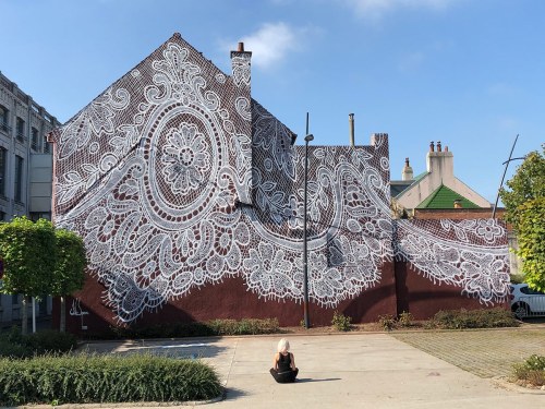 mymodernmet:NeSpoon painted one of her signature lace murals on the fashion and lace museum in Calais. 